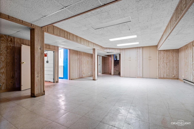 595 Crab Tree Ln, Lake Forest, IL 60045 - finished basement with wooden walls, light floors, and a paneled ceiling