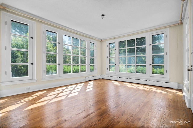 595 Crab Tree Ln, Lake Forest, IL 60045 - unfurnished sunroom with plenty of natural light, baseboard heating, and french doors