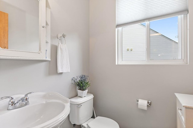 691 Glen Cove Ln, Pingree Grove, IL 60140 - half bathroom featuring a sink and toilet