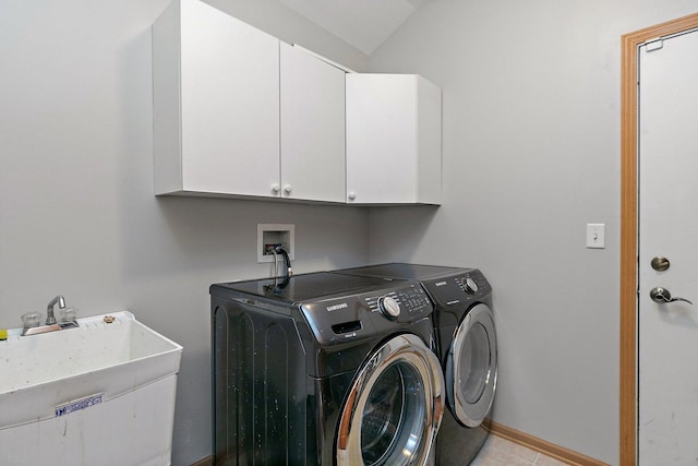 691 Glen Cove Ln, Pingree Grove, IL 60140 - laundry room featuring cabinet space, washing machine and dryer, and light tile patterned flooring