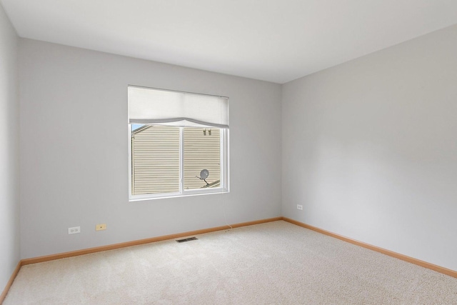 691 Glen Cove Ln, Pingree Grove, IL 60140 - spare room with carpet floors and baseboards
