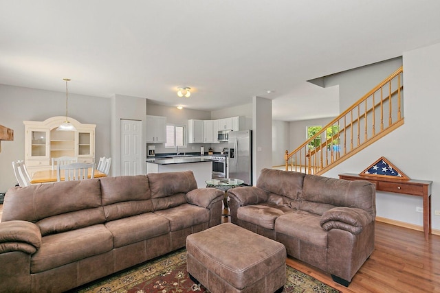 691 Glen Cove Ln, Pingree Grove, IL 60140 - living area featuring light wood-type flooring and stairs