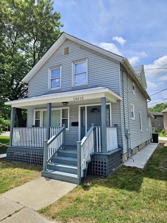 14610 Lincoln Ave, Dolton, IL 60419 - view of front of home with covered porch and a front yard