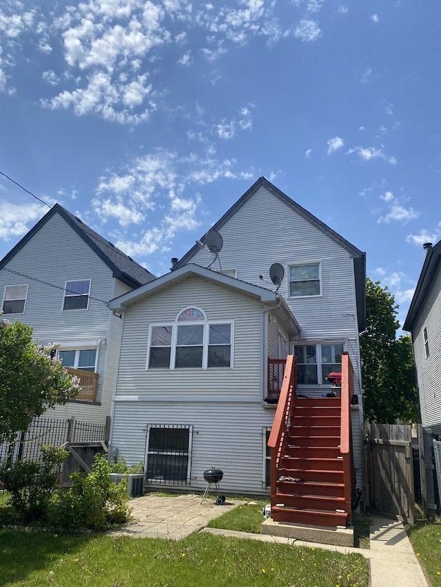6419 S Kenwood Ave, Chicago, IL 60637 - rear view of house with a patio area