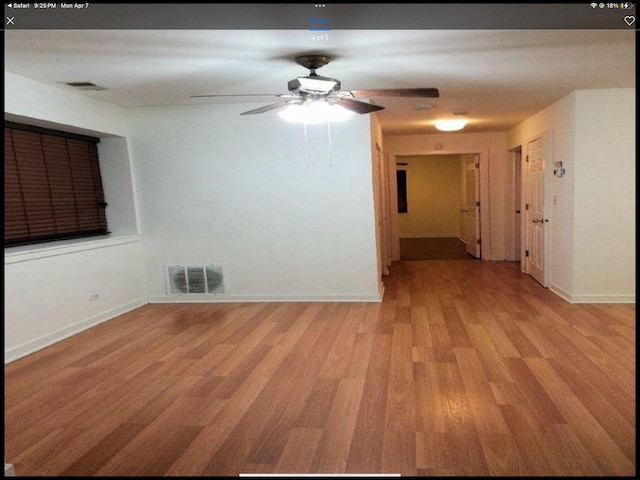 6419 S Kenwood Ave, Chicago, IL 60637 - spare room featuring light wood finished floors and a ceiling fan
