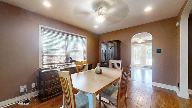 1713 Glenn Park Dr, Champaign, IL 61821 - dining room with arched walkways, a ceiling fan, french doors, wood finished floors, and recessed lighting