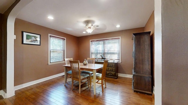 1713 Glenn Park Dr, Champaign, IL 61821 - dining space with hardwood / wood-style flooring, arched walkways, and recessed lighting