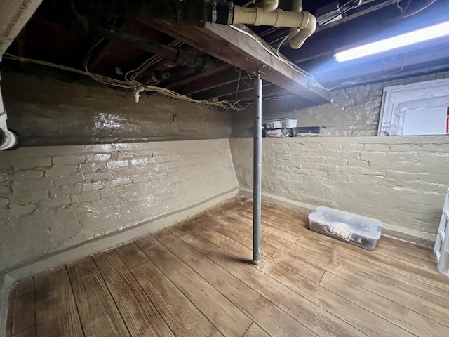 1713 Glenn Park Dr, Champaign, IL 61821 - unfinished basement featuring wood finished floors and baseboards