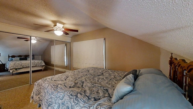 1713 Glenn Park Dr, Champaign, IL 61821 - carpeted bedroom featuring vaulted ceiling, a textured ceiling, ceiling fan, and a closet