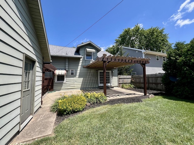 1713 Glenn Park Dr, Champaign, IL 61821 - rear view of property with a pergola, a patio, and roof with shingles