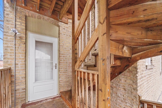 2414 W Bryn Mawr Ave Unit 1W, Chicago, IL 60659 - property entrance with brick siding