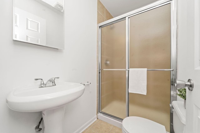 2414 W Bryn Mawr Ave Unit 1W, Chicago, IL 60659 - full bathroom with a stall shower and tile patterned floors