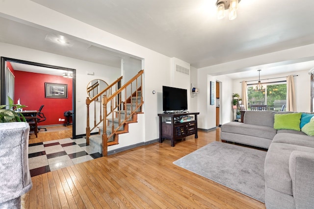 281 S Western Ave, Bartlett, IL 60103 - living room featuring light wood finished floors and stairway