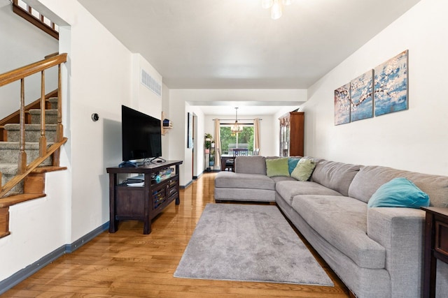 281 S Western Ave, Bartlett, IL 60103 - living room featuring light wood-style floors and stairway