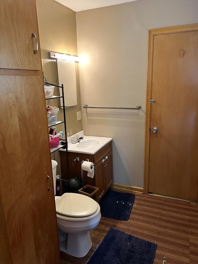 1265 Hillcrest Ln, Freeport, IL 61032 - bathroom with vanity and wood finished floors