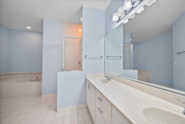 1348 Averill Cir, Geneva, IL 60134 - full bathroom featuring tile patterned floors, a bath, double vanity, a shower with door, and recessed lighting