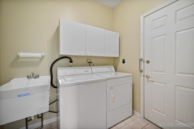 1348 Averill Cir, Geneva, IL 60134 - laundry room with cabinet space, washer and clothes dryer, and light tile patterned floors