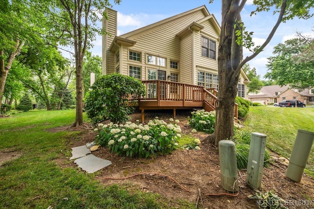 1348 Averill Cir, Geneva, IL 60134 - back of house featuring a chimney, a wooden deck, and a lawn
