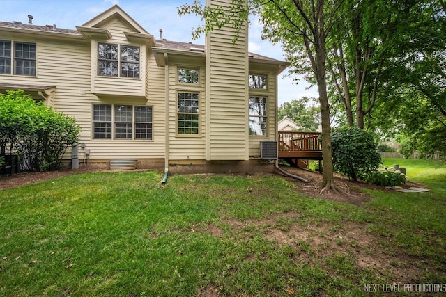 1348 Averill Cir, Geneva, IL 60134 - back of property with a chimney, a lawn, and a wooden deck