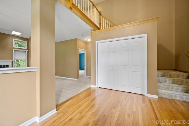 1348 Averill Cir, Geneva, IL 60134 - entrance foyer featuring stairs, wood finished floors, and a high ceiling