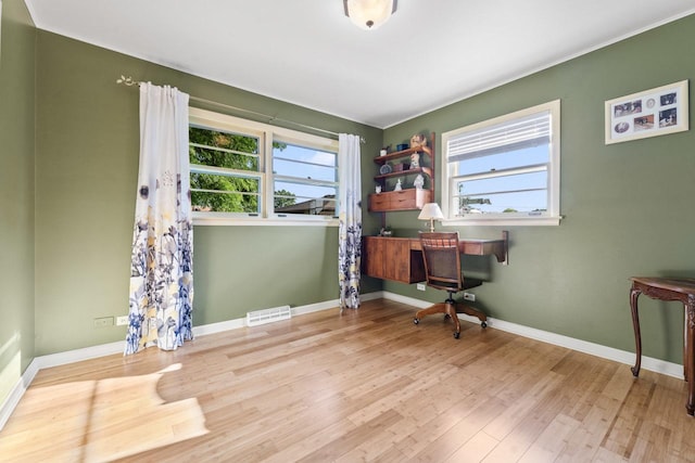 6411 W 88th St, Oak Lawn, IL 60453 - office area featuring healthy amount of natural light and wood finished floors