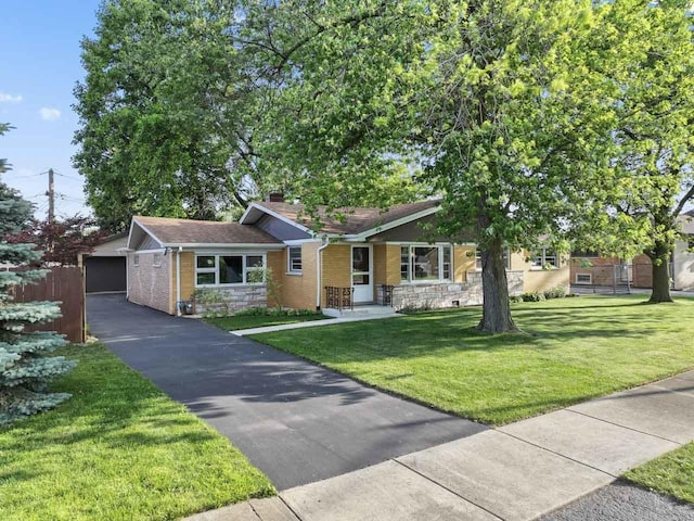 6411 W 88th St, Oak Lawn, IL 60453 - view of front facade featuring a front yard, a chimney, and brick siding