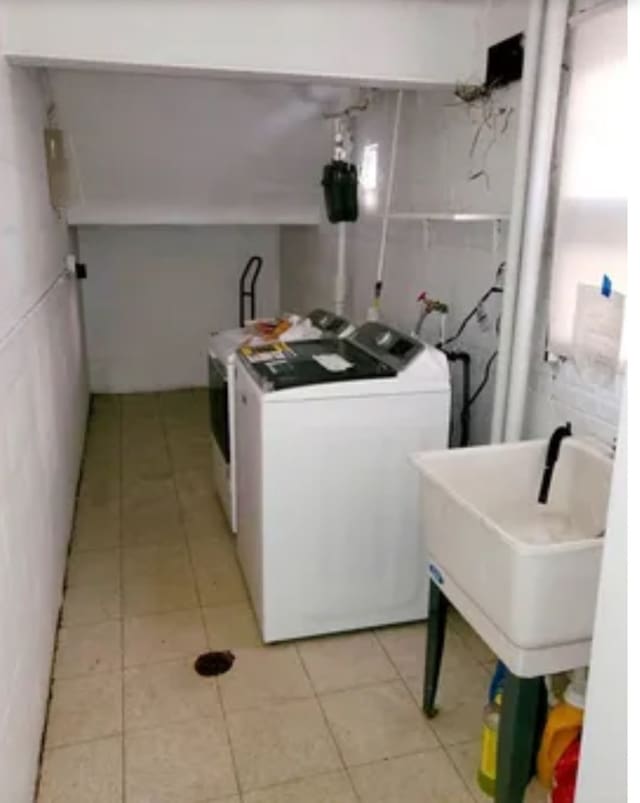 1629 E 92nd St, Chicago, IL 60617 - laundry room featuring hookup for a washing machine, tile walls, and light tile patterned floors