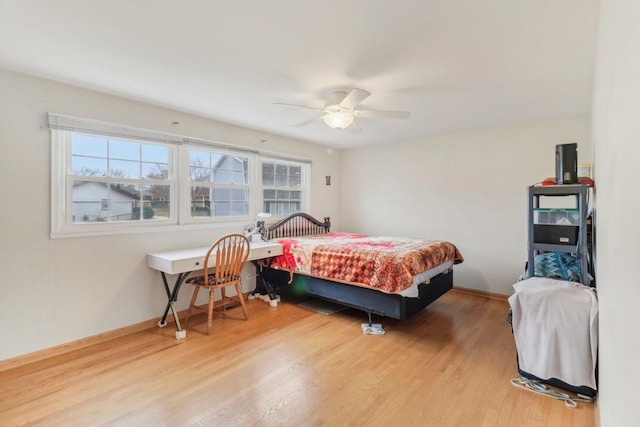 712 Dante Ct, Schaumburg, IL 60193 - bedroom with light wood-type flooring and a ceiling fan