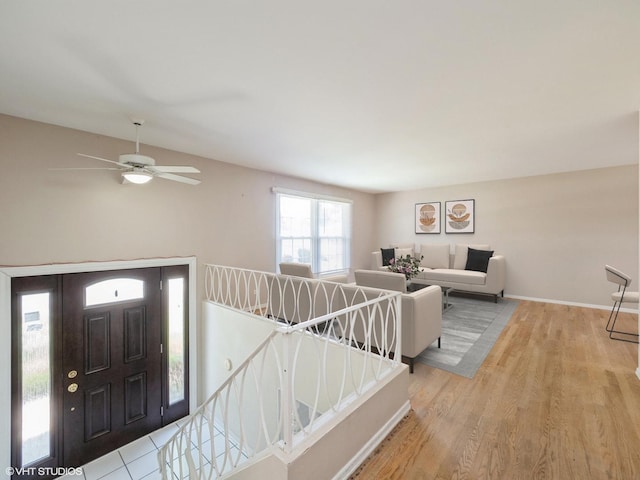 712 Dante Ct, Schaumburg, IL 60193 - entryway featuring light wood-style flooring and a ceiling fan