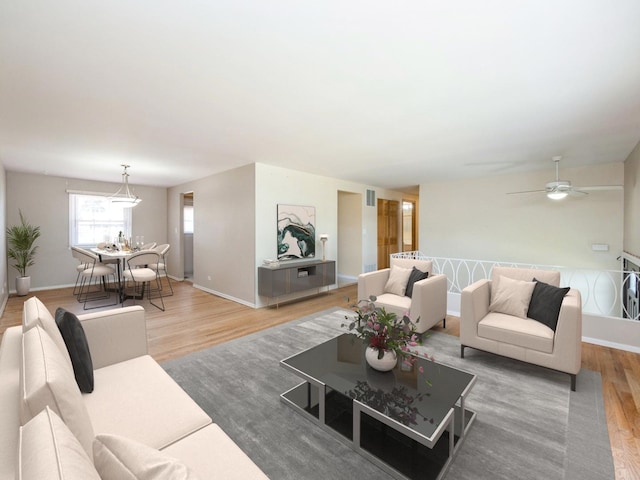 712 Dante Ct, Schaumburg, IL 60193 - living area featuring wood finished floors and ceiling fan