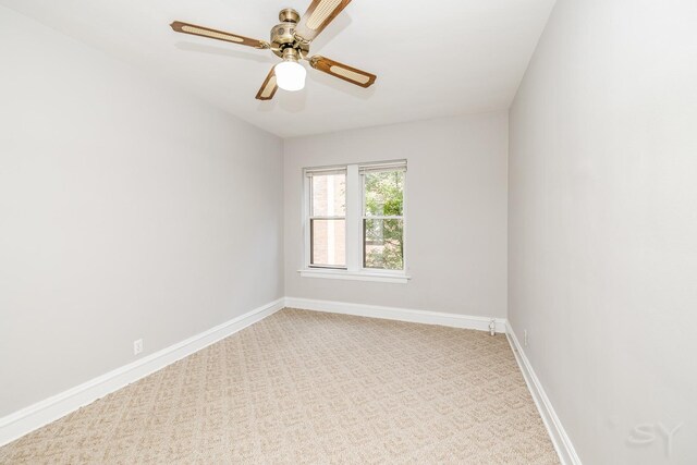 6751 N Artesian Ave Unit 2C, Chicago, IL 60645 - empty room with light carpet and a ceiling fan