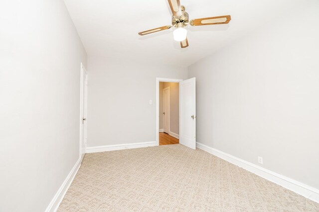 6751 N Artesian Ave Unit 2C, Chicago, IL 60645 - spare room featuring a ceiling fan and baseboards