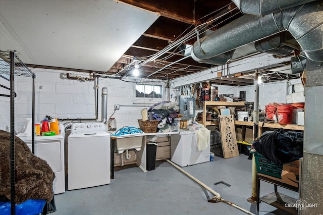 263 W Illinois Ave, Aurora, IL 60506 - below grade area featuring separate washer and dryer, electric panel, and a workshop area