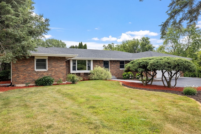 24935 S Ridge Rd, Elwood, IL 60421 - ranch-style house with brick siding, a front yard, an attached garage, driveway, and roof with shingles