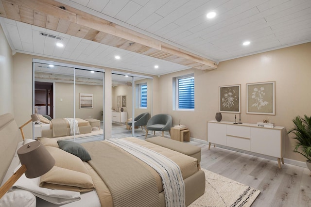 24935 S Ridge Rd, Elwood, IL 60421 - bedroom featuring light wood-type flooring, multiple closets, a wood ceiling with exposed beams, and recessed lighting