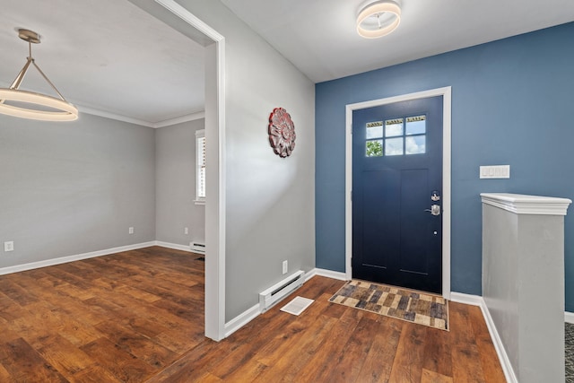 24935 S Ridge Rd, Elwood, IL 60421 - foyer entrance with a baseboard heating unit and wood finished floors