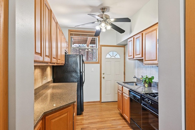 245 W Washington Blvd Unit 2B, Oak Park, IL 60302 - kitchen featuring black appliances, a ceiling fan, decorative backsplash, and light wood finished floors