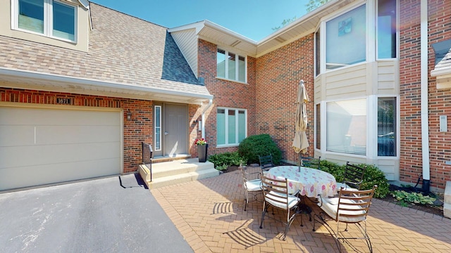 1671 N Belmont Ct, Arlington Heights, IL 60004 - view of patio featuring driveway