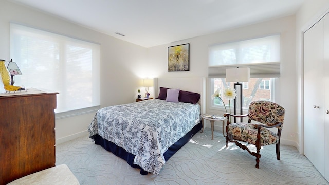 1671 N Belmont Ct, Arlington Heights, IL 60004 - carpeted bedroom featuring multiple windows
