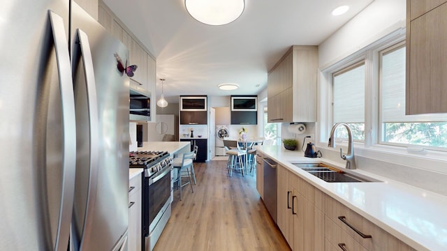1671 N Belmont Ct, Arlington Heights, IL 60004 - kitchen featuring stainless steel appliances, light brown cabinetry, light countertops, modern cabinets, and recessed lighting