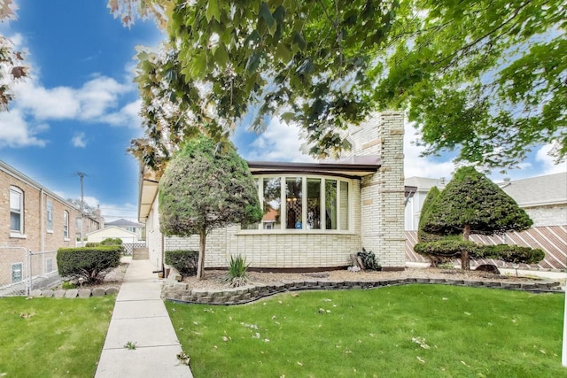 5215 S Meade Ave, Chicago, IL 60638 - view of front facade with brick siding and a chimney
