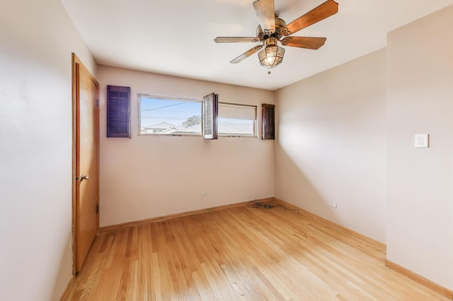 5215 S Meade Ave, Chicago, IL 60638 - empty room featuring light wood finished floors and ceiling fan