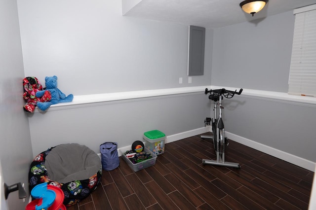 165 E Clay St, El Paso, IL 61738 - exercise area featuring baseboards and wood finished floors