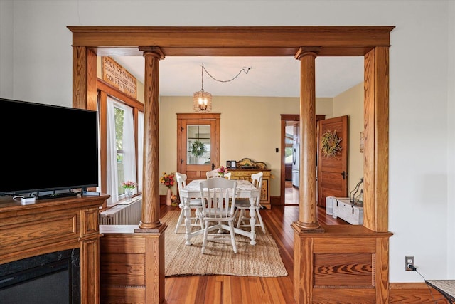 887 N 1100e Rd, Melvin, IL 60952 - dining room with wood finished floors and decorative columns