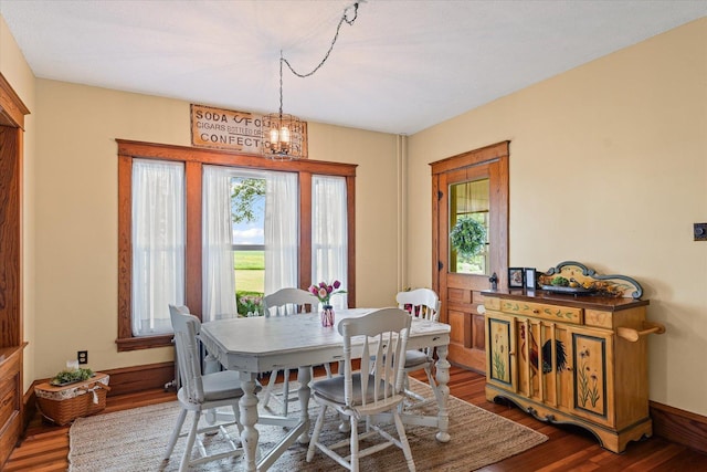 887 N 1100e Rd, Melvin, IL 60952 - dining space with wood finished floors and a chandelier