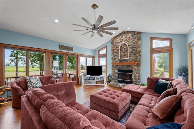 887 N 1100e Rd, Melvin, IL 60952 - living room with ceiling fan, lofted ceiling, wood finished floors, a fireplace, and recessed lighting