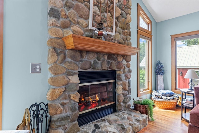 887 N 1100e Rd, Melvin, IL 60952 - detailed view of a stone fireplace and wood finished floors