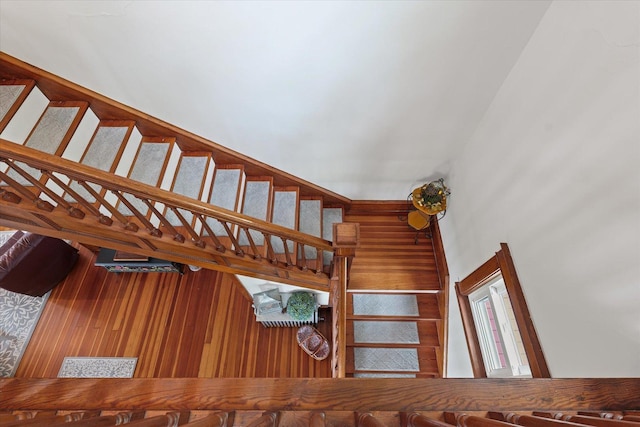 887 N 1100e Rd, Melvin, IL 60952 - stairway featuring a high ceiling and wood walls
