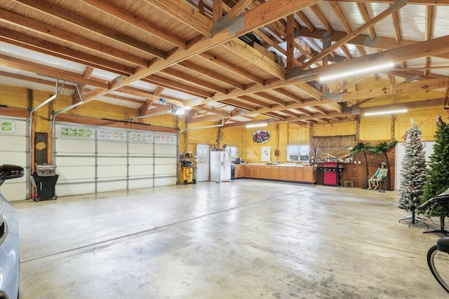 887 N 1100e Rd, Melvin, IL 60952 - garage featuring white fridge with ice dispenser