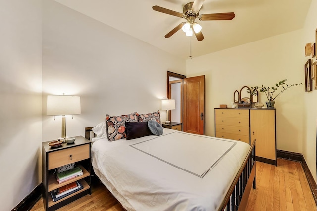 3740 N Whipple St, Chicago, IL 60618 - bedroom featuring light wood-type flooring and a ceiling fan